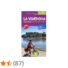 Guía de la ViaRhôna, un recorrido ciclista del lago Lemán al Mediterráneo. Una ciclista pedalea junto al río Ródano.
